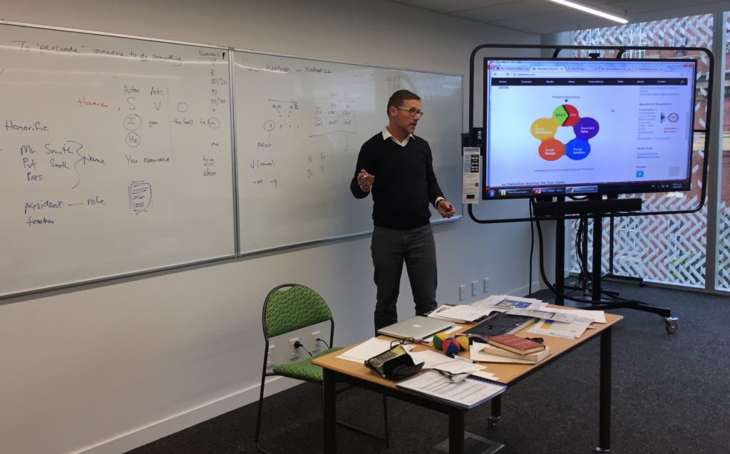 Simon Hertnon teaching his Business and Government Writing Essentials course for Kāpuhiphi Wellington-Uni Professional